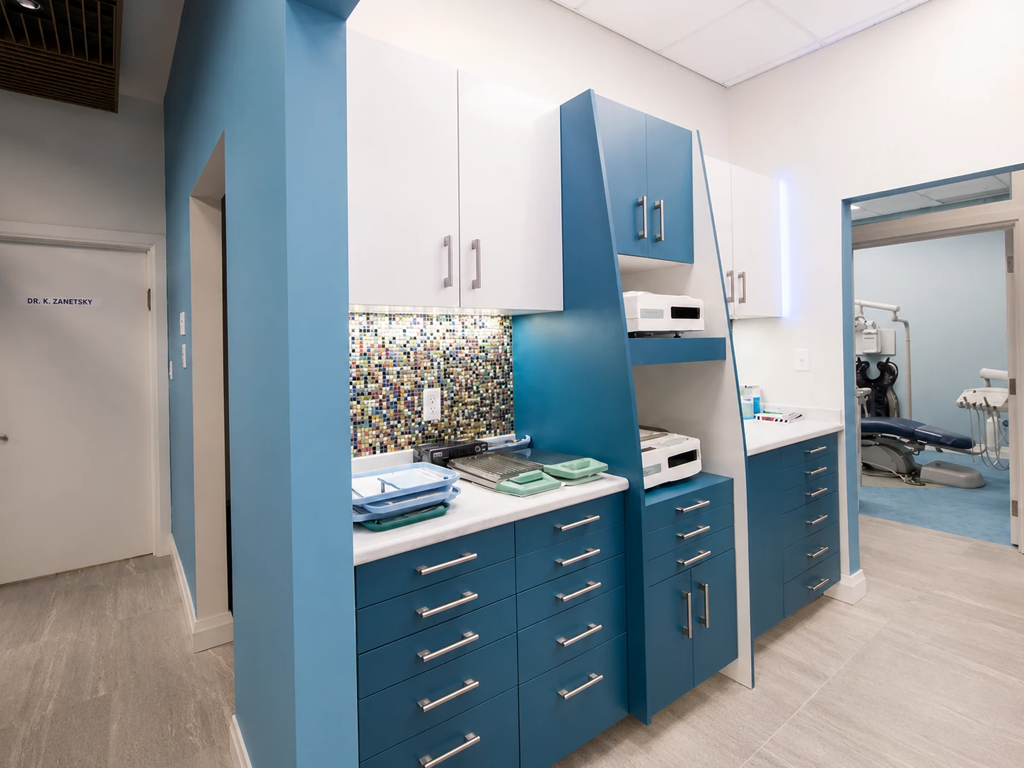 Sterilization workstation with blue cabinets