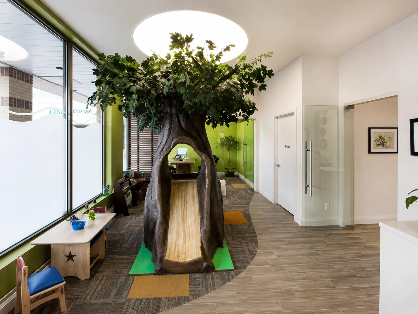 Sculpted tree-trunk reading nook in the reception area