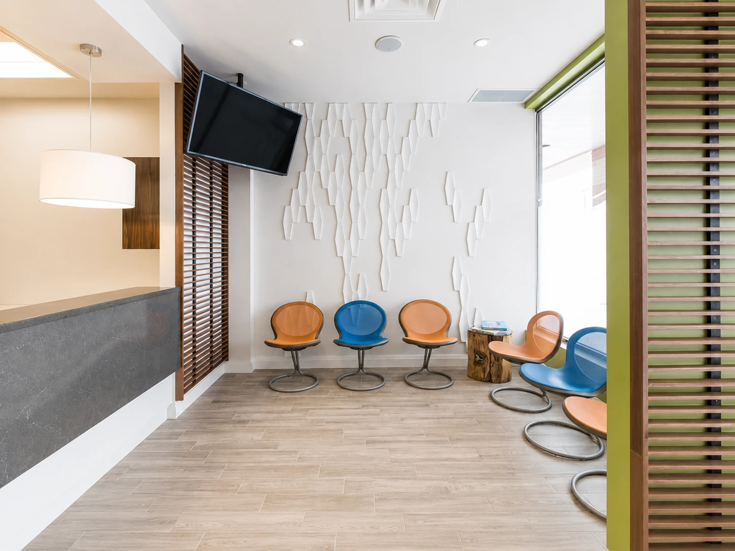 Waiting area with modern colourful chairs